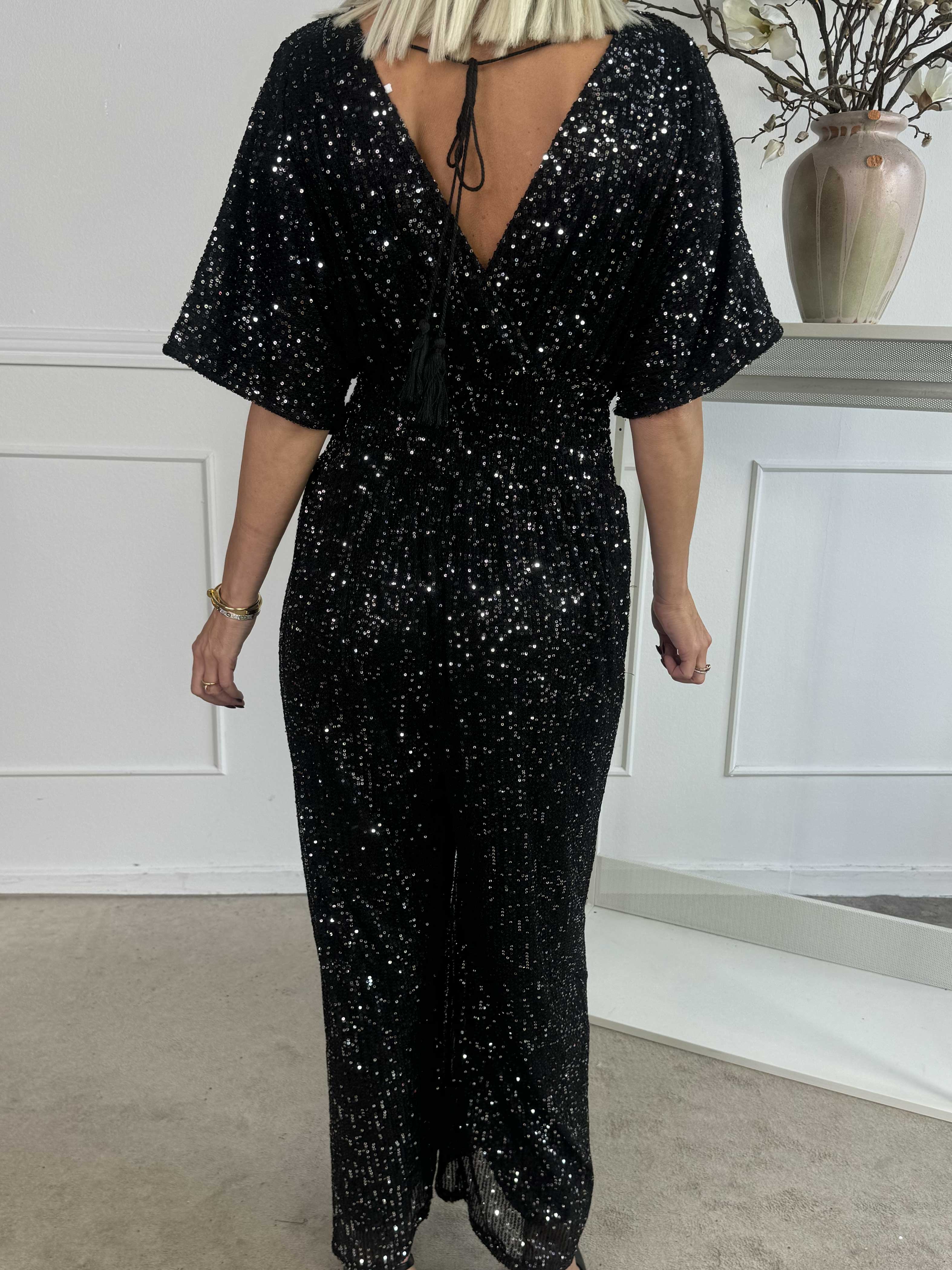 Pams Glitter Jumpsuit - Elastisk jumpsuit med smock och paljetter